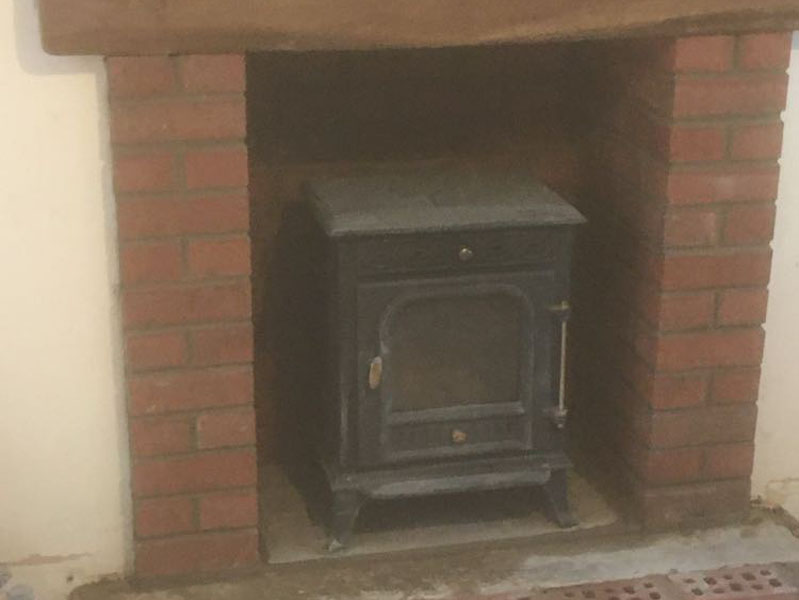 example of WPPlasterig finished fireplace with added brick slips